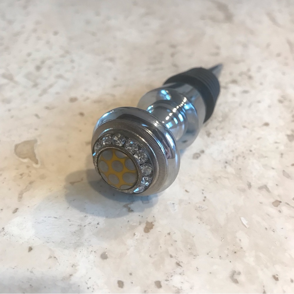 EUC Wine Bottle Stopper approx 4” long. Decorative. Heavy with rubber stopper.